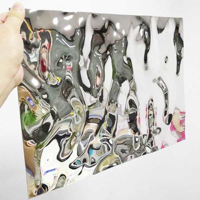 अच्छी कीमत रंग 304 2MM मोटाई दर्पण चांदी स्टेनलेस स्टील पानी लहर शीट पैनल ऑनलाइन